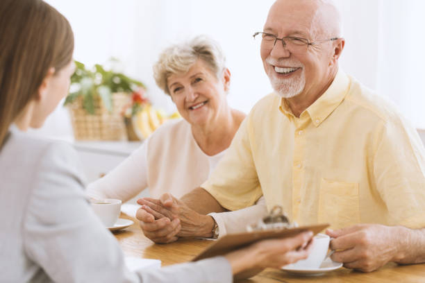 A couple of people sitting at a table